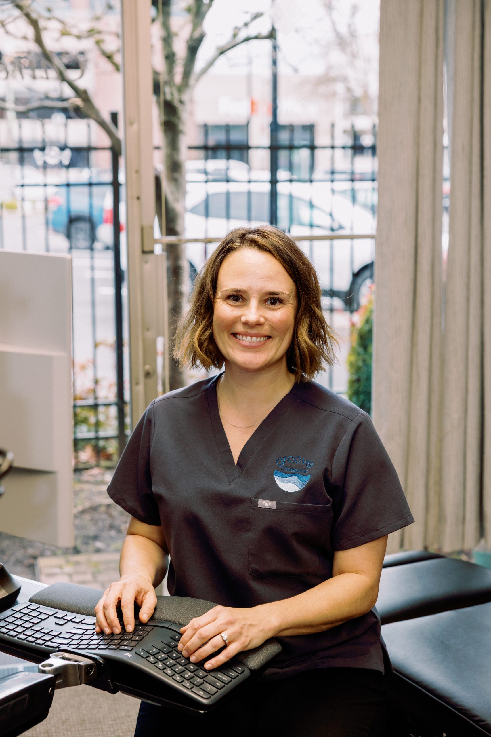 Dr. Cydney at her computer